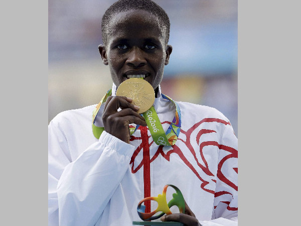 revealed-why-athletes-bite-their-medals-after-winning-at-olympics revealed-why-athletes-bite-their-medals-after-winning-at-olympics