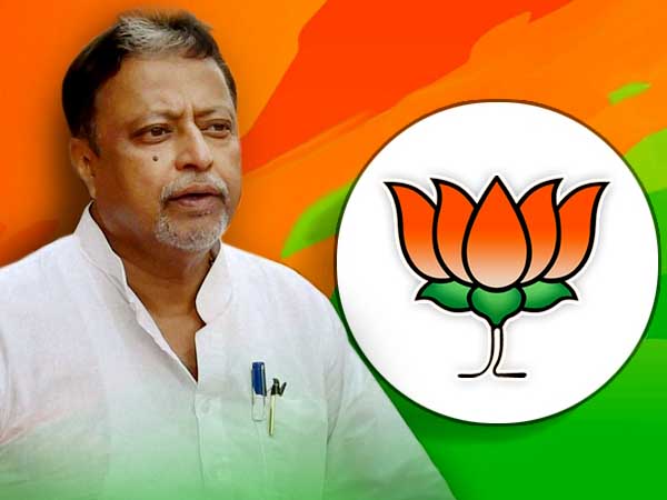 গেরুয়া নামাবলীই গায়ে জড়াচ্ছেন মুকুল! কার হাতের পতাকা পাচ্ছেন জানুন বিশদে গেরুয়া নামাবলীই গায়ে জড়াচ্ছেন মুকুল! কার হাতের পতাকা পাচ্ছেন জানুন বিশদে