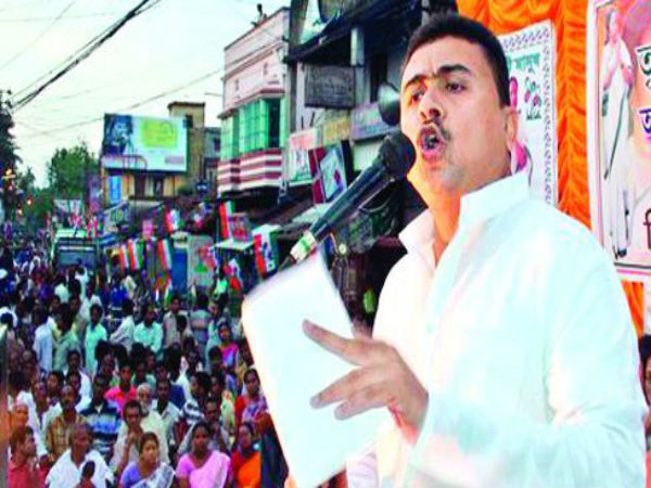 'টিএমসি'-র নতুন ব্যাখ্যা দিলেন শুভেন্দু, সঙ্গে মুকুল রায়কে এমনই কড়া আক্রমণ 'টিএমসি'-র নতুন ব্যাখ্যা দিলেন শুভেন্দু, সঙ্গে মুকুল রায়কে এমনই কড়া আক্রমণ