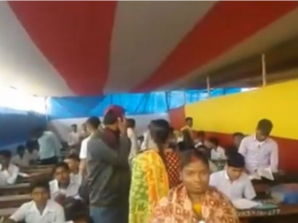 প্যান্ডেলে বসে খাতা পেড়ে মাধ্যমিক পরীক্ষা! ডেবরার স্কুলের ঘটনায় ক্ষুব্ধ পর্ষদ সচিব প্যান্ডেলে বসে খাতা পেড়ে মাধ্যমিক পরীক্ষা! ডেবরার স্কুলের ঘটনায় ক্ষুব্ধ পর্ষদ সচিব