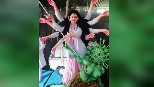 করোনা রূপে অসুর, চিকিৎসকের ভূমিকায় মা দুর্গা! ফের কলকাতার পুজো ভাবনার প্রশংসায় নেট দুনিয়া করোনা রূপে অসুর, চিকিৎসকের ভূমিকায় মা দুর্গা! ফের কলকাতার পুজো ভাবনার প্রশংসায় নেট দুনিয়া