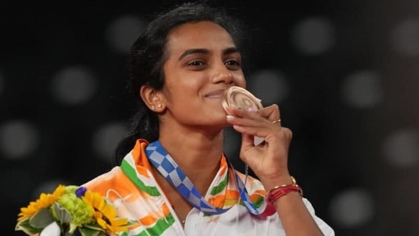 পোডিয়ামে চেনা হাসি