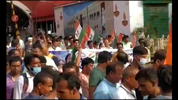 মতুয়া মহাসঙ্ঘের তৃণমূল অনুগামীরা মিছিল করে সমাবেশে
