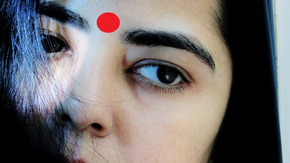 টিপ পরা মেয়ে