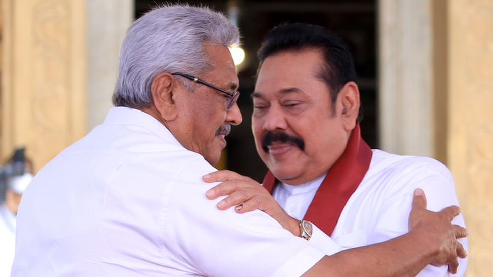 President Gotabaya Rajapaksa (left) hugs his brother Mahinda during a ceremony in August 2020 President Gotabaya Rajapaksa (left) hugs his brother Mahinda during a ceremony in August 2020